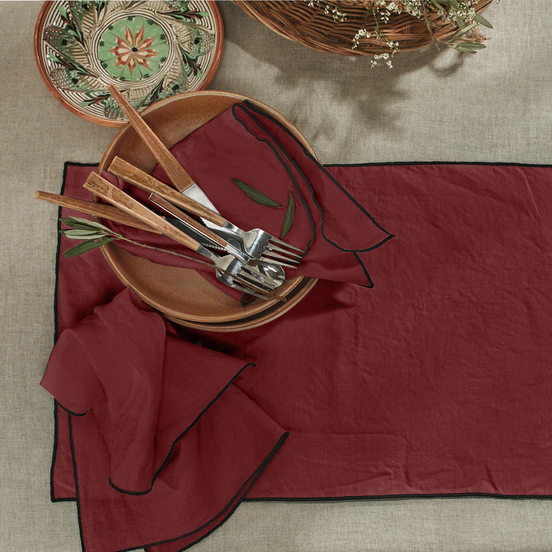 Set de table bordé en lin lavé brique