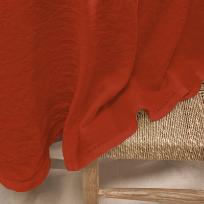 Nappe ovale en lin lavé ajouré sur mesure corail