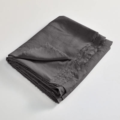 drap plat en lin lavé effrangé plié Gris Plomb