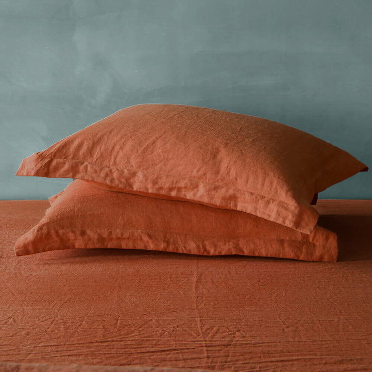 A Pair of Linen Flange Pillow Sham in Coral
